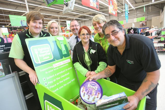 Collection point for Calderdale Food and Support at Halifax Asda, Thrum Hall.
From the left, staff Richard Mooney, Toni Brown, Phil Kenyon,Claire Walker, Amanda Clegg and customer Mick Hazeltine.
