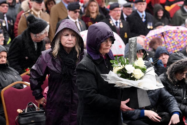 Families of the victims lay wreaths at the memorial.