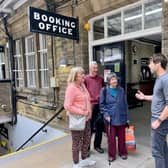 Councillor Scott Patient speaking to rail users at Hebden Bridge Train Station