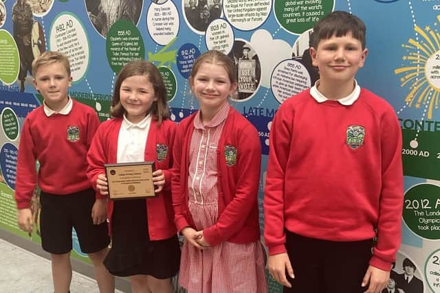 Pupils from Calder Primary School with the gold award
