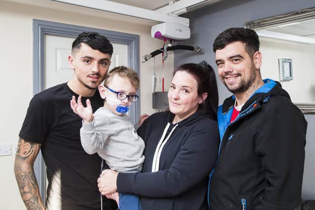 Callum Cushing, left, with his brother Blake, four and mum Joanne and dad Alan.