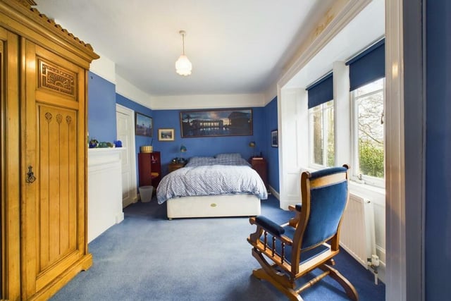 Another of the property's double bedrooms, with views over the garden.