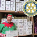 Rotarian elves hard at work sorting out boxes at Santa’s Grotto