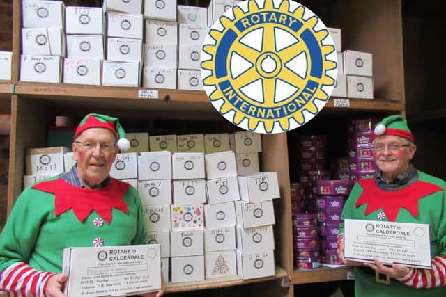Rotarian elves hard at work sorting out boxes at Santa’s Grotto