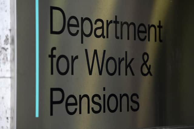A view of signage for the Department of Work &amp; Pensions in Westminster, London.