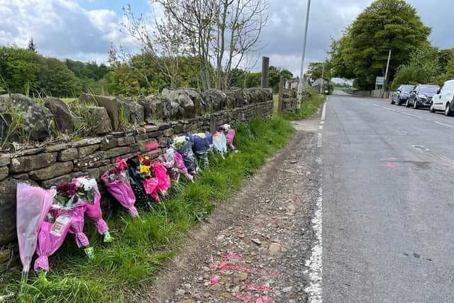 Flowers at the scene of the crash in Barkisland