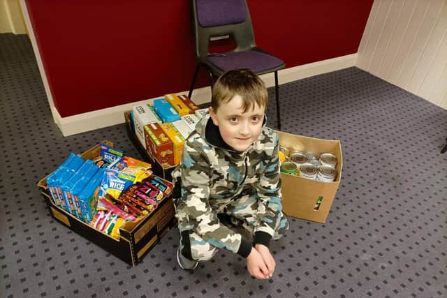 Alfie Depledge has been spending his pocket money on donations for the food bank
