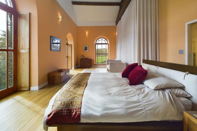 A stunning bedroom suite with far-reaching views.