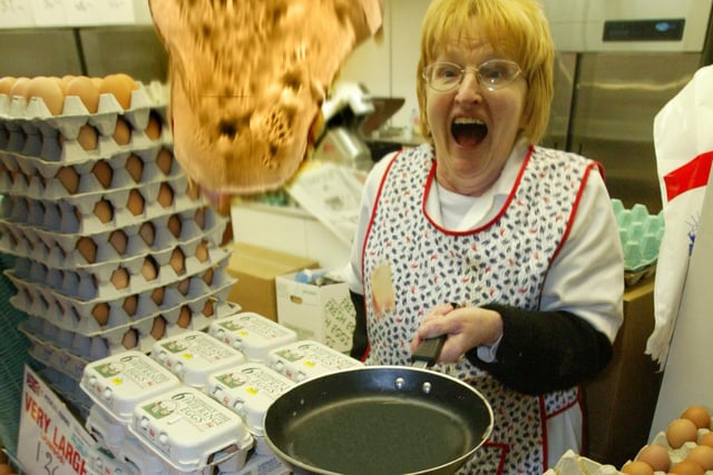 Shirley Asquith, Manager of Pickles Farms Ltd in the Halifax Market, flipping pancakes for Pancake Day back in 2005.