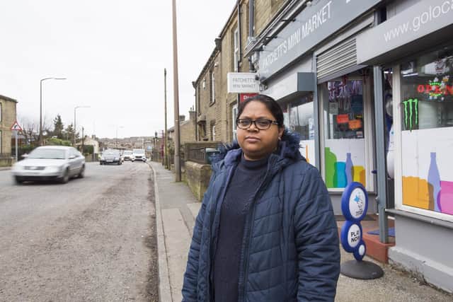 Shopkeeper Sonja Gupta at Patchett's Mini Market, on the busy A647 at Ford Hill, Queensbury.
