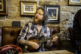 Graham Thompson gave the customers at 1832 Barista in St James Street, Bacup, a sneak preview of the debut single from his new album – ‘Beer on a Hook’. Picture: Jeff Johnson Photography