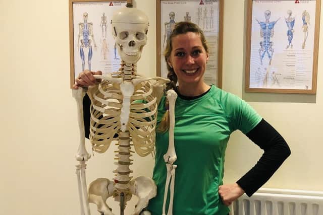 Jen Redfern, lead physiotherapist and company owner of Plus Health Company with Ralph, the resident skeleton