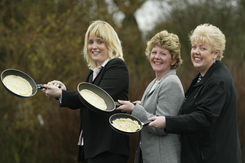Pancake race at St Malachys RC J&I school back in 2004. Claire Metcalfe, Healthy school coordinator, Lesley Spurr, schools administrator, and headteacher Margaret Stichbury.