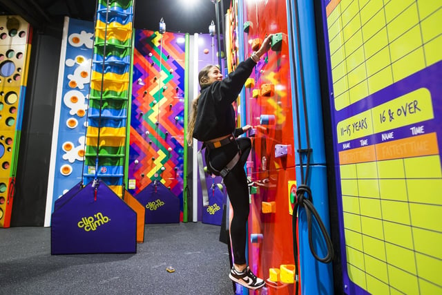 Brittney Ioannou demonstrating one of the walls at Clip 'n Climb