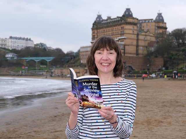 Author Glenda Young with the first in her Seaview cosy crime series in Scarborough's South Bay