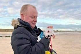 Neil with the rescued pup