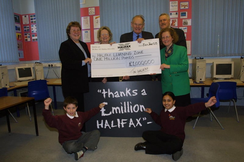 Warley Road School headteacher Vickie Mellor back in 2003 with Alice Mahon MP, Sir Anthony Tippet, Ann O'Brien, and Carlton Midgley, with two pupils.