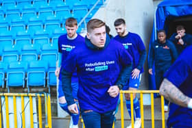 FC Halifax Town warming up in their shirts promoting the Stroke Association