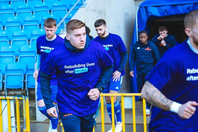 FC Halifax Town warming up in their shirts promoting the Stroke Association