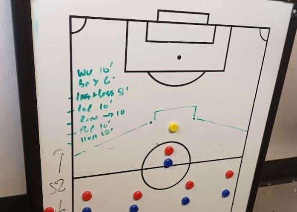 One of the whiteboards at the Town training ground