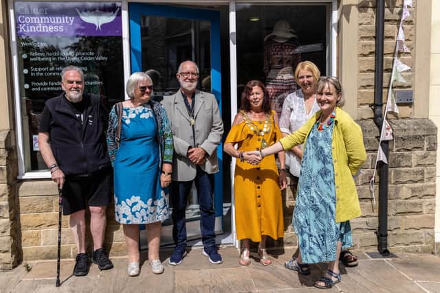 Andy Hinton, Bernice Hayes, Kevin Hoyle, Mayor Jane Hoyle, shop manager Catriona Lucas and Calder Community Cares founder member Jan Lymer. Picture: Craig Shaw