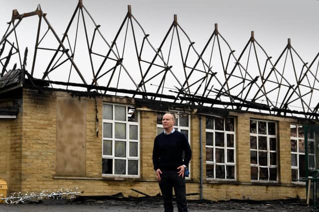 Headteacher Mungo Sheppard pictured outside the school after the fire
