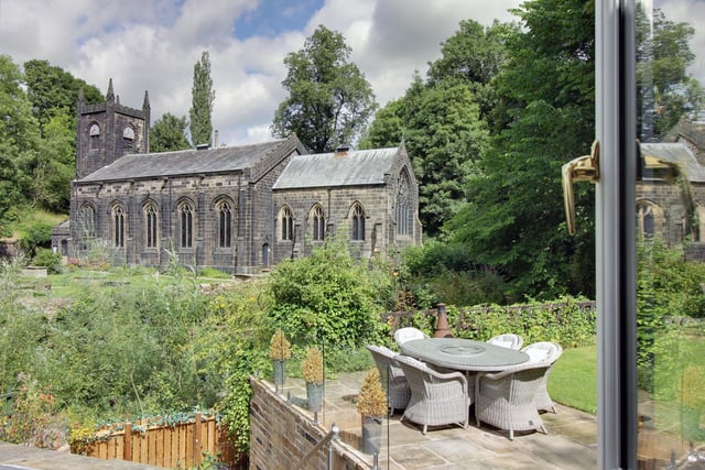 A choice spot to sit and relax, overlooking the river and a centuries old church.