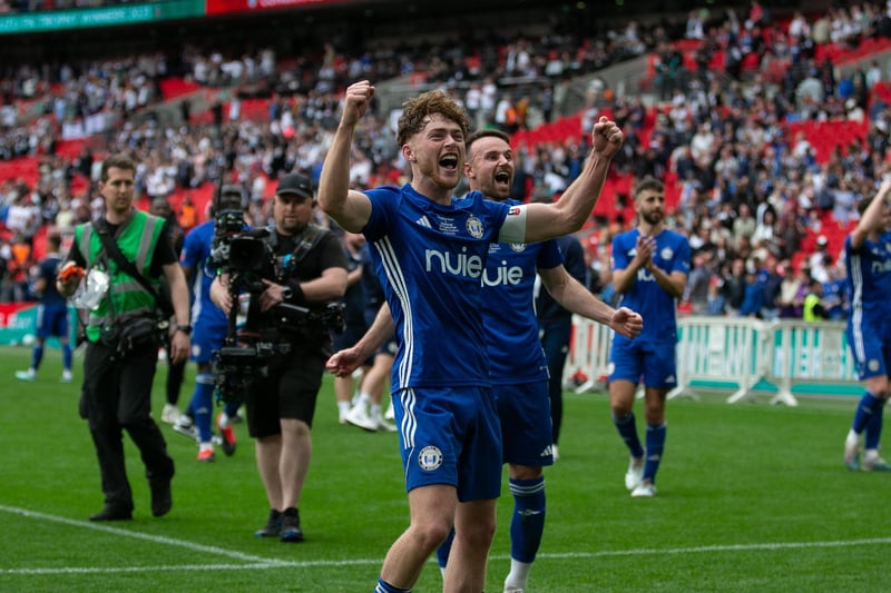 Town players celebrate their victory over Gateshead at Wembley.