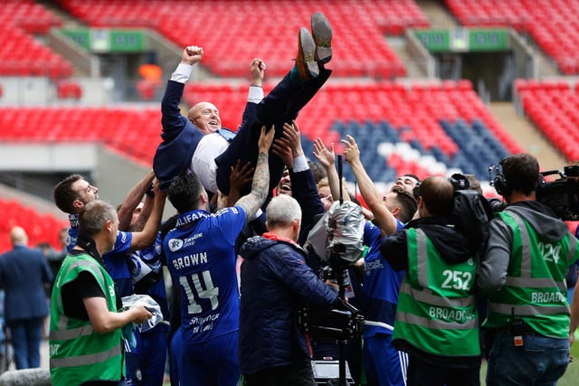 LONDON, ENGLAND - MAY 22: Halifax Town manager Jim Harvey is thrown in air after his team won the FA Trophy Final match between Grimsby Town FC v FC Halifax Town at Wembley Stadium on May 22, 2016 in London, England.  (Photo by Joel Ford/Getty Images)
