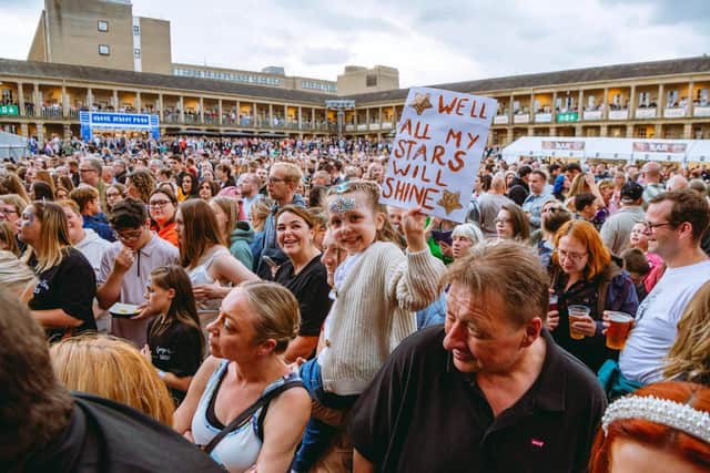 Crowds watching George Ezra at The Piece Hall earlier this summer