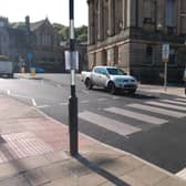 A consultation notice at the new zebra crossing at Halifax Road in Todmorden town centre