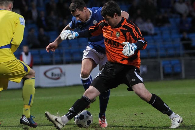 Action from the first-leg of the 2013 play-off tie against Guiseley at The Shay.