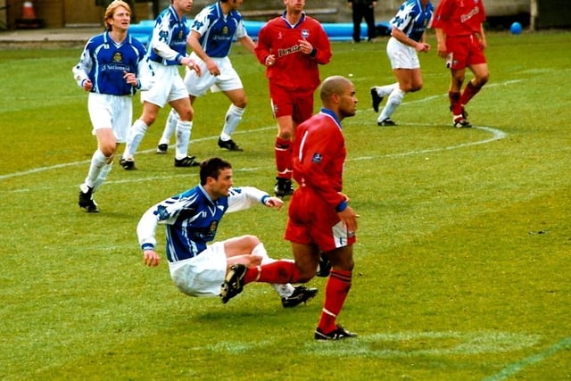 Andy Thackeray clears, Town v Brighton, April 17, 1999