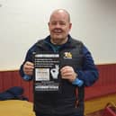 Mark Holden with a certificate from Andy's Man Club