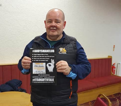 Mark Holden with a certificate from Andy's Man Club