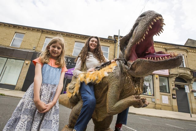 Nora Main, six, with Tony the T-Rex and Ranger Jessi.