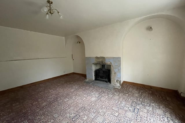 A reception room with fireplace.