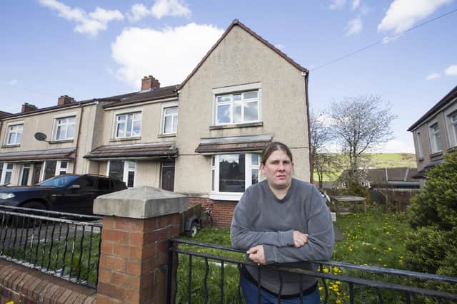 Sara Atkins outside her fire-damaged home in Ovenden.