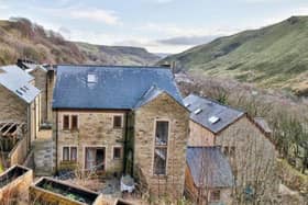 This cul-de-sac home close to the centre of Todmorden has stunning valley views from its hillside location.