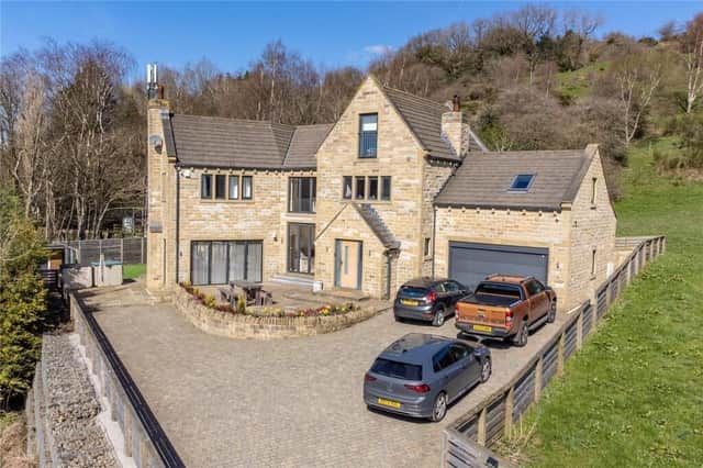 A modern hillside home, for sale at £800,000.
