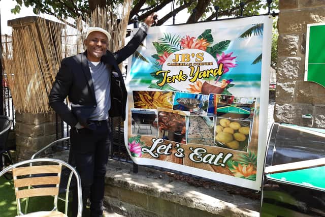Joseph Belibi, General Manager at The Shakespeare Deluxe Hotel and Kitchen, at his new alfresco dining area JB's Jerk Yard