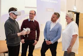 Industry experts at Calderdale College to test the virtual reality prototype that the college's Digital T Level students have created to help with social care training. Pictured are Sam Bradbury from NHS England, Karl Veltman deputy principal and Caren Reid from Calderdale and Huddersfield NHS Foundation Trust