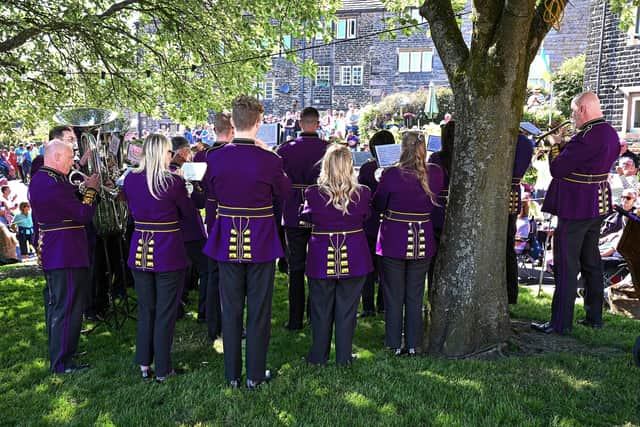 B&R playing in the shade of the trees at Dobcross at the Whit Friday contest
