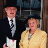 Keith Ackroyd after being presented with his CBE and his wife Gwenda