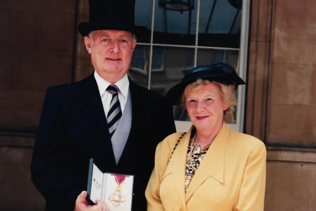 Keith Ackroyd after being presented with his CBE and his wife Gwenda