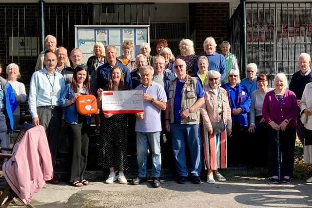 The Friends of Crow Wood Park team receive the donation