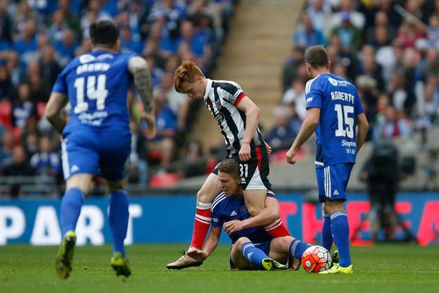 LONDON, ENGLAND - MAY 22:  Gregor Robertson of Grimsby Town and Nicky Wroe of Halifax Town tussle for the ball during the FA Trophy Final match between Grimsby Town FC v FC Halifax Town at Wembley Stadium on May 22, 2016 in London, England.  (Photo by Joel Ford/Getty Images)