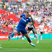 Jamie Cooke charges down James Montogomery for the only goal as FC Halifax Town beat Gateshead to lift the FA Trophy at Wembley Stadium.