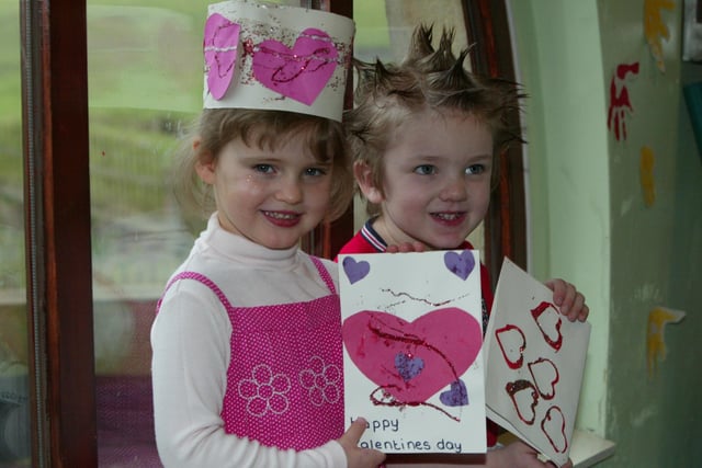 Katheryn Souter, three, and Keelan Foster, four, at Triangle Day Nursery's red themed event for Valentine's Day in 2004