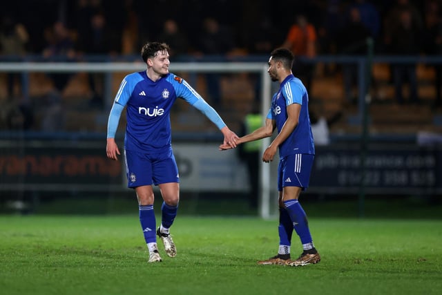 HALIFAX, ENGLAND - MARCH 20: Rob Harker of FC Halifax Town celebrates scoring his team's first goal with teammate Aaron Cosgrave during the Vanarama National League match between FC Halifax Town and Chesterfield at The Shay on March 20, 2024 in Halifax, England.  (Photo by George Wood/Getty Images)